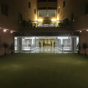 نرجس الحديقة فندق